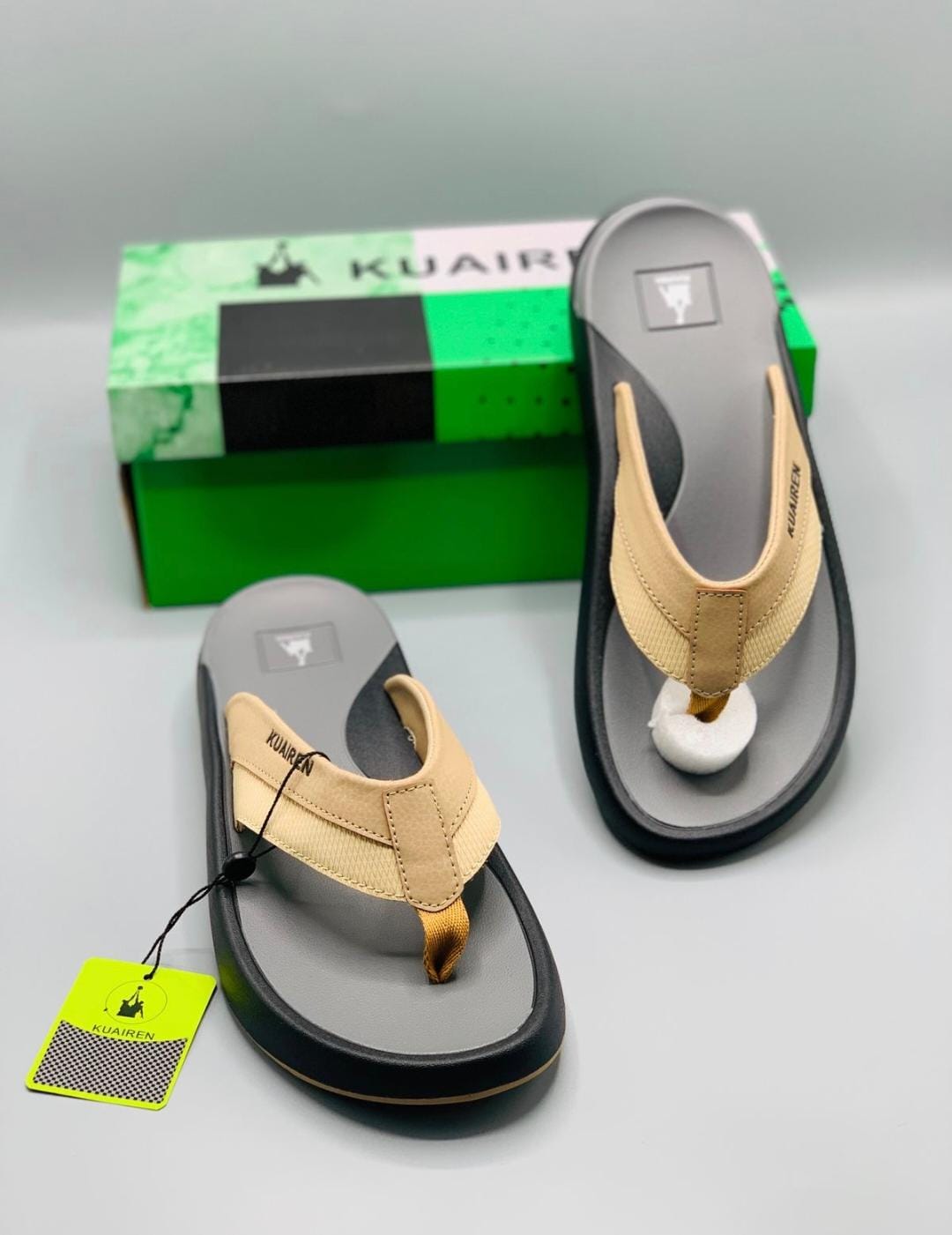 Kuairen Slides – Beige with grey sole, shown with green Kuairen branded box